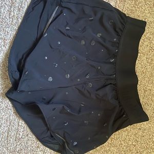 Lululemon black logo high rise hotty hot shorts